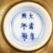 Pair of gold-coloured porcelain cups, marked Kangxi