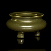 Olive green porcelain tripod incense burner, with Qianlong seal