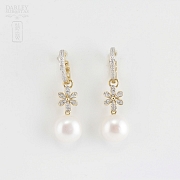 Precious pearl and diamond earrings