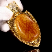 Gold-plated silver and Hetian jade pendant “Feline,” Qing dynasty