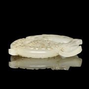 Carved white jade pendant “Dragon,” Han dynasty