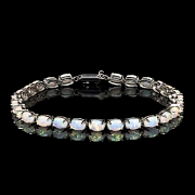 Pulsera de oro blanco con ópalos
