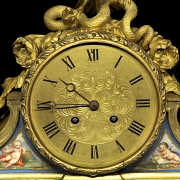 Mantel clock in bronze and porcelain, France, 19th century.