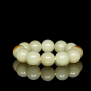 Pulsera de doce cuentas de jade blanco, dinastía Qing