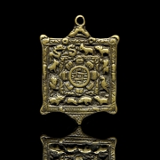 Amuleto de bronce
