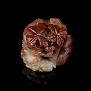 Carved Nanhong agate ‘Rabbits and leaves’, Qing dynasty