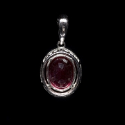 Colgante de oro blanco de 18k con rubí y diamantes