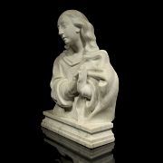 Busto de mármol tallado