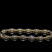 Pulsera de oro amarillo con zafiros