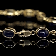 Pulsera de oro amarillo con zafiros