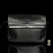 Nina Ricci “Bandolera negra”
