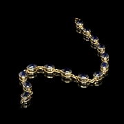Pulsera de oro amarillo con zafiros