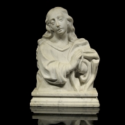 Busto de mármol tallado