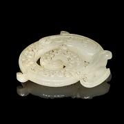 Carved white jade pendant “Dragon,” Han dynasty