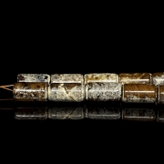Necklace with twenty carved stone beads, Han style.