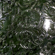 Spinach green jade vase ‘Eight Treasures’, Qing dynasty