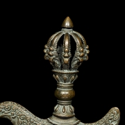 Elemento de ritual de bronce