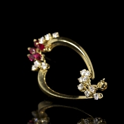 Broche de oro amarillo de 18 kt con rubíes y diamantes