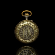 Gold-plated metal pocket watch with inscription
