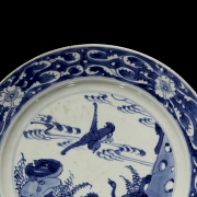 Pareja de platos de porcelana 