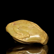 Figura de jade amarillo
