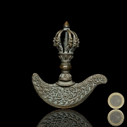 Elemento de ritual de bronce