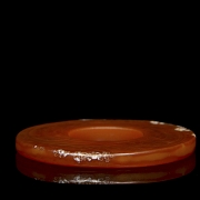 Disco de ágata roja tallada, dinastía Zhou