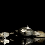 Dos figuras de plata 