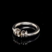 Anillo de plata y oro amarillo con diamante