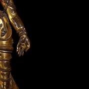 Figura de bronce dorado 