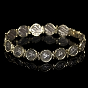 Juego de pulsera y pendientes de oro amarillo con monedas antiguas