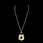 Necklace with carved jade pendant and coloured beads, 20th century