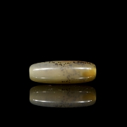 Carved agate Dzi bead, Liao dynasty