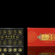 Juego de doce de monedas conmemorativas