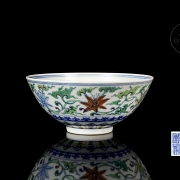 Porcelain bowl with doucai enamels, ‘Flowers’, with Qianlong seal