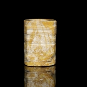 Cong de jade tallado