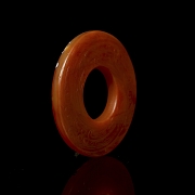 Disco de ágata roja tallada, dinastía Zhou