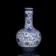 Blue and white porcelain vase ‘Dragon among flowers’, with Qianlong seal