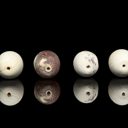 Four large carved stone beads, Qing dynasty