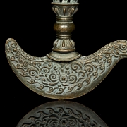 Elemento de ritual de bronce