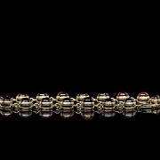 Pulsera de oro amarillo con gemas
