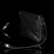 Nina Ricci “Bandolera negra”