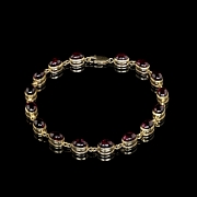 Pulsera de oro amarillo con gemas