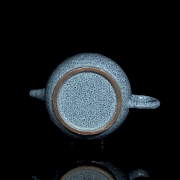 Tetera de cerámica con esmalte azul moteado