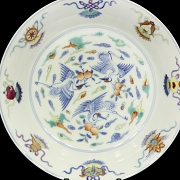 Glazed porcelain plate ‘Buddhist Emblems’, with Yongzheng mark