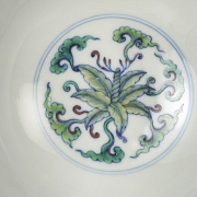 Porcelain bowl with doucai enamels, ‘Flowers’, with Qianlong seal