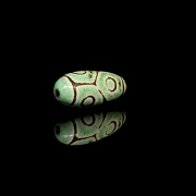 Cuenta Dzi de piedra tallada