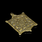 Amuleto de bronce