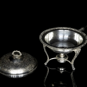 Calentador de metal plateado, s.XX