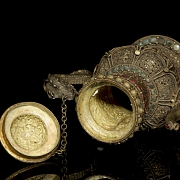 Tetera de bronce dorado y piedras